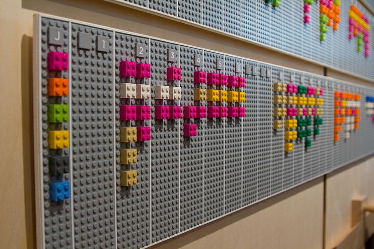 legos are arranged on the wall to make a world map for children's room