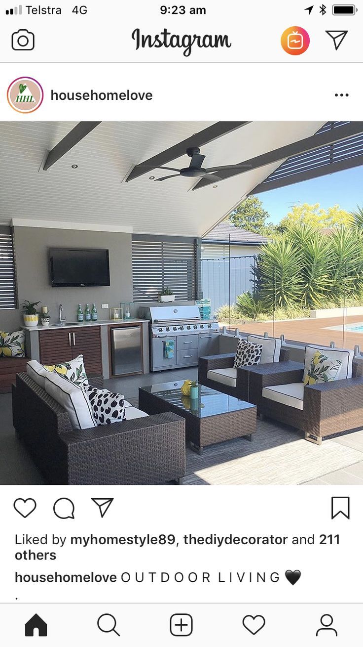 an instagram photo of a living room and kitchen in the back yard with outdoor living