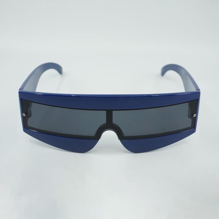 Style: S2963 Shape: Shield Protection: UV400 Lens Material: Plastic Eye/Bridge/Temple: 65/20/135 (mm) Galaxy Futuristic Shield Sunglasses - S2963 Actual colors may vary. This is because every computer monitor has a different capability to display colors, and everyone sees these colors differently. We edit our photos to show the samples as life-like as possible, but please understand that the actual color may vary slightly from your monitor. We cannot guarantee that the color you see accurately portrays the product's color. Futuristic Shield, Pretty Sunglasses, Mens Glasses Fashion, Trendy Shades, Oversized Round Sunglasses, Unique Sunglasses, Ladies Gents, Shield Design, Shield Sunglasses