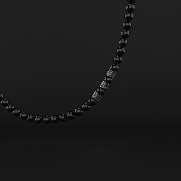 Presenting the Royale Necklace from Seekers – where luxury meets a journey of personal and spiritual growth. This 8mm necklace, designed for the modern seeker, combines regal elegance with subtle hints of self-discovery and spiritual awakening. It's more than a symbol of sophistication; it's a tool for reflection and growth, enhancing your journey towards a life of refined grace and meaningful depth. All our stones are chosen by hand to satisfy AAA quality standards. They are natural stones and Elegant Jewelry With Box Chain And Round Beads, Luxury 8mm Onyx Beads Jewelry, Luxury Black Necklace With Polished Beads, Elegant Silver Necklace With 8mm Beads, Classic Single Strand Onyx Necklace, Luxury Onyx 8mm Beads Jewelry, Classic Onyx Single Strand Necklace, Classic Sterling Silver Necklaces With 8mm Beads, Black Jewelry With Sterling Silver Clasp For Everyday