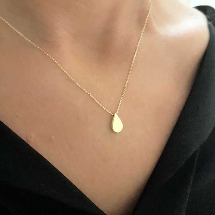 -The tear drop design women jewelry pendant necklace is made with high quality 14K real solid gold. - We recommend you to review our other bracelets and necklaces. We have listed many kinds of beautiful and trendy gold and silver products. You won't regret! https://www.etsy.com/shop/LatikaJewelryShop - This cute, charm, dainty, delicate, elegant, and trendy women jewelry pendant necklace has been artfully designed for timeless yet modern millennial fashion. and you can order in three different c Tear Drop Necklace Simple, Tear Drop Necklaces, Yellow Gold Teardrop Pendant Drop Necklace As Gift, Fine Jewelry 14k Gold Drop Necklace For Gift, Yellow Gold Teardrop Drop Necklace For Gift, 14k Gold Drop Necklace As Gift, 14k Gold Drop Necklace Gift, Fine Jewelry Pear-shaped Drop Necklace As Gift, Fine Jewelry Pear-shaped Drop Necklace For Gift