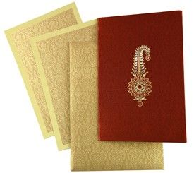 three different types of wedding cards in gold, red and white with an intricate paisley design