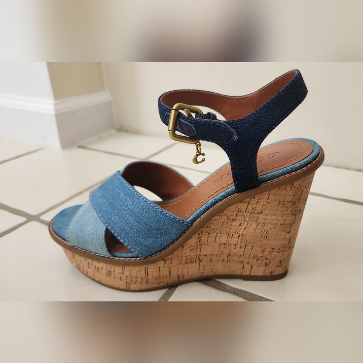 Rare Find. New, Original Coach Cross Band Wedge Sandals In Outstanding Color Size 7.5. They Don't Fit Me Anymore Need A Half Size Up. Buckle Closure 4 1/4" Heel, 1 1/2" Platform Genuine Cork Platform Rubber Sole For More Details And Look: Https://Www.Coach.Com/Products/Cross-Band-High-Wedge-Sandal/G3164.Html Blue Wedge Sandals With Cushioned Footbed, Coach Casual Wedge Sandals For Spring, Casual Coach Wedge Sandals For Beach, Casual Summer Coach Heels, Coach Wedge Heel Sandals For Spring, Coach High Heel Wedge Sandals For Spring, Coach Summer Wedge Sandals With Round Toe, Casual Coach Platform Wedge Sandals, Coach Wedge Heel Sandals For Summer