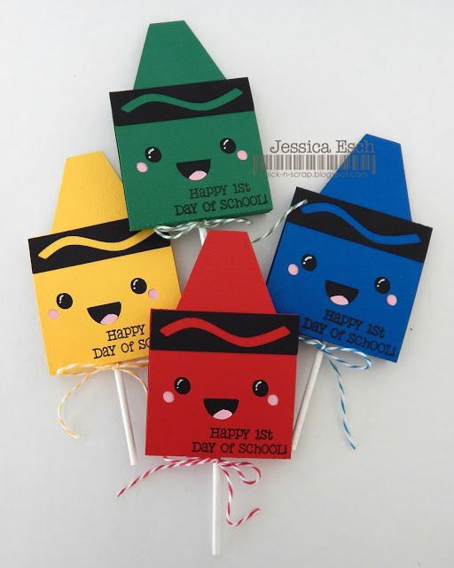 four colorful candy bags with faces on them