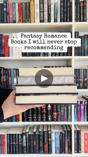 someone is holding up some books in front of a book shelf full of books and the caption reads, fantasy romance books i will never stop recommending