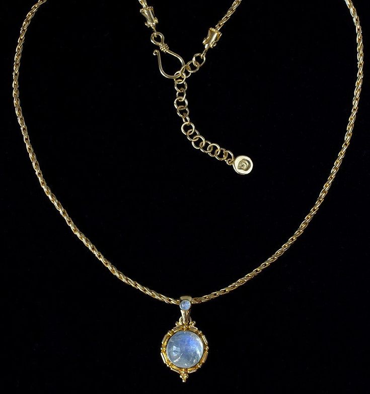 Gold Rainbow Moonstone Necklace This 18K Gold Vermeil Rainbow Moonstone necklace is handcrafted with a detailed Balinese-inspired design, accented by a smaller Rainbow Moonstone on the bail. Comfortable to wear every day, it can be dressed up or dressed down for any occasion. The 18K Gold Vermeil necklace is individually packaged in our black Bluemoonstone Creations gift box with a description card, describing the spiritual and beneficial healing properties of the Rainbow Moonstone gemstones along with a brief bio of the designer. All of our Gold Vermeil Moonstone jewelry is designed in America by Pamela Forman and handcrafted in Bali, where Balinese artisans apply their exquisite skill and traditional background in jewelry-making. Explore our full Tibetan Moon Gold Collection to discover Gold Moonstone Necklace For Formal Occasions, Formal Gold Moonstone Necklace, Moonstone Pendant Necklace For Formal Occasions, Elegant Moonstone Necklaces For Formal Occasions, Elegant Moonstone Necklace For Formal Occasions, Elegant Formal Moonstone Necklaces, Elegant Formal Moonstone Necklace, Balinese Design, Traditional Background