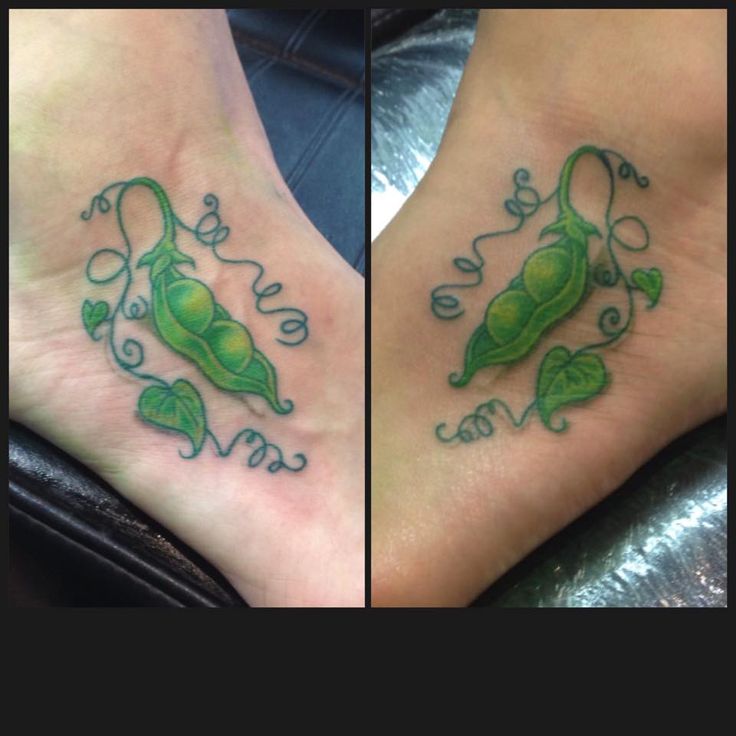 two green tattoos on the feet of people