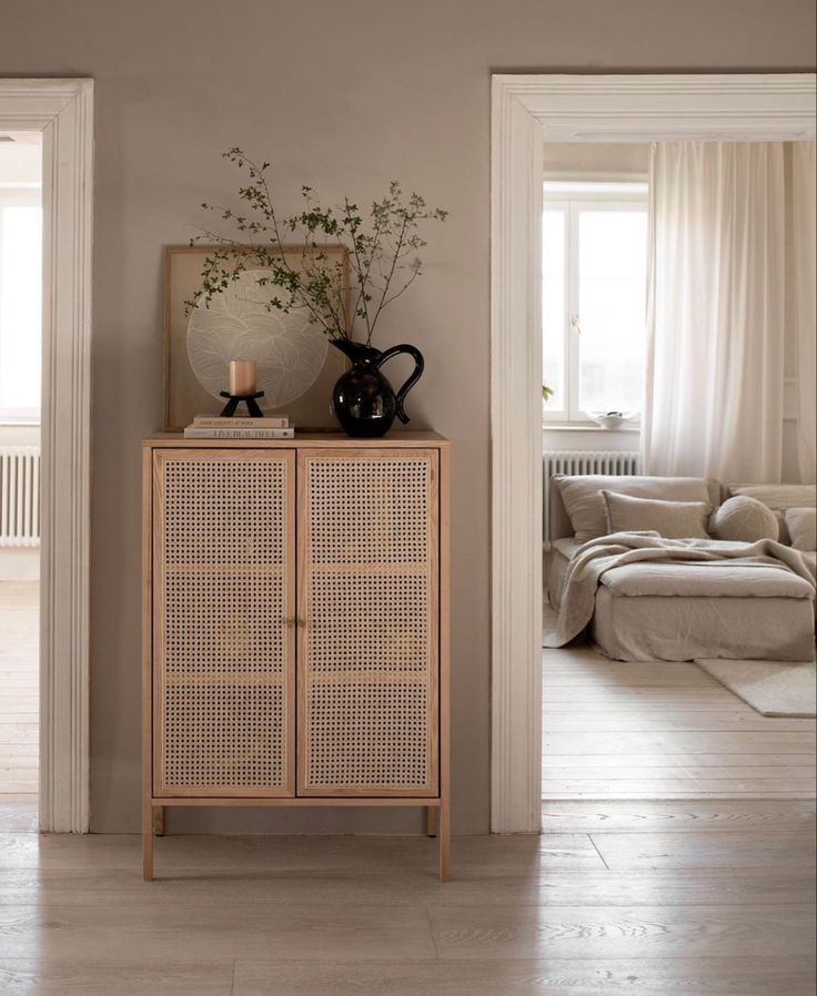 a living room filled with furniture and decor