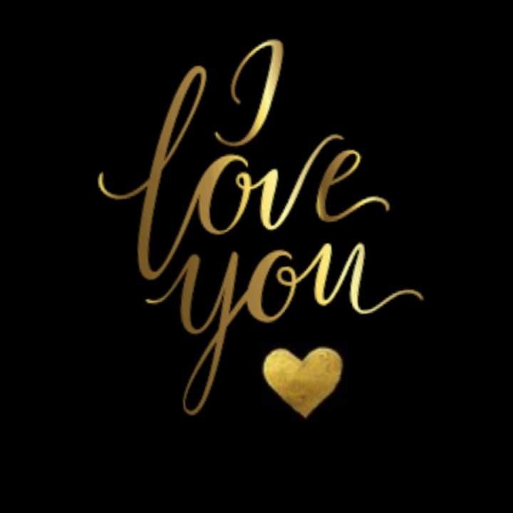 the words love you written in gold foil on a black background with a golden heart