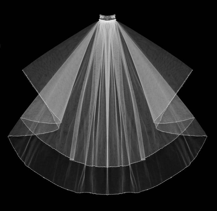 a white veil on top of a black background