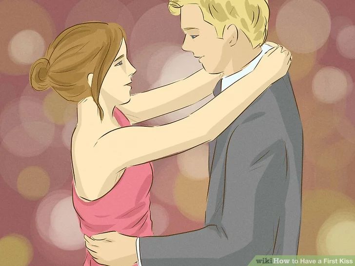 a man and woman are dancing together in front of bright boket backdrops