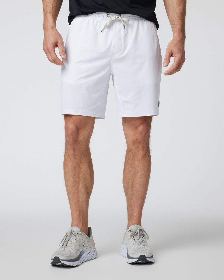 One short for every sport, the Kore Shorts have a classic athletic fit, falling just above the knee with an anywhere and everywhere versatility. Go commando in confidence with the breathable, boxer-brief liner. | Vuori Kore Shorts | White | XS Vuori makes premium performance apparel inspired by the active Coastal California lifestyle; an integration of fitness, surf, sport, and art. Breaking down the boundaries of traditional activewear, we are a new perspective on performance apparel. White Athletic Shorts With 4-way Stretch For Sports, Sporty White 4-way Stretch Shorts, White 4-way Stretch Athletic Shorts For Sports, White Sporty Shorts With 4-way Stretch, White 4-way Stretch Sporty Shorts, White Nylon Athletic Shorts With Go-dry Technology, White Athleisure Shorts With Go-dry Technology, White 4-way Stretch Athletic Shorts For Gym, White Go-dry Athleisure Shorts