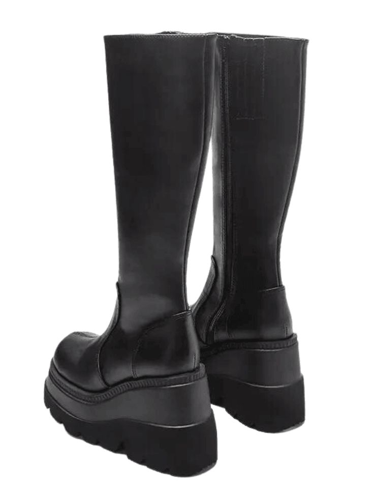 Step out in style and comfort with these Platform Boots For Winter. Designed with a high platform heel, these boots will give you an extra boost of height and a fashionable lift to your look. The cozy construction and faux leather details will keep your feet warm and dry during cold winter days. From elevated streetwear to formal wear, this is the perfect boot to help you keep warm and look on trend. Check out our collection of women's coats while you're here! Specifications Platform Boots For W Knee-high Chunky Platform Heeled Boots For Winter, Faux Leather High Ankle Platform Boots For Streetwear, High Ankle Faux Leather Platform Boots For Streetwear, Streetwear High Ankle Platform Boots In Faux Leather, Trendy Knee-high Faux Leather Platform Boots, Fall Knee-high Platform Boots, Fall High Cut Faux Leather Heeled Boots, Fall Knee-high Platform Boots In Polyurethane, Fall High-cut Faux Leather Heeled Boots