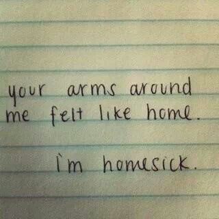 a handwritten note with the words your arms around me felt like home i'm homesick