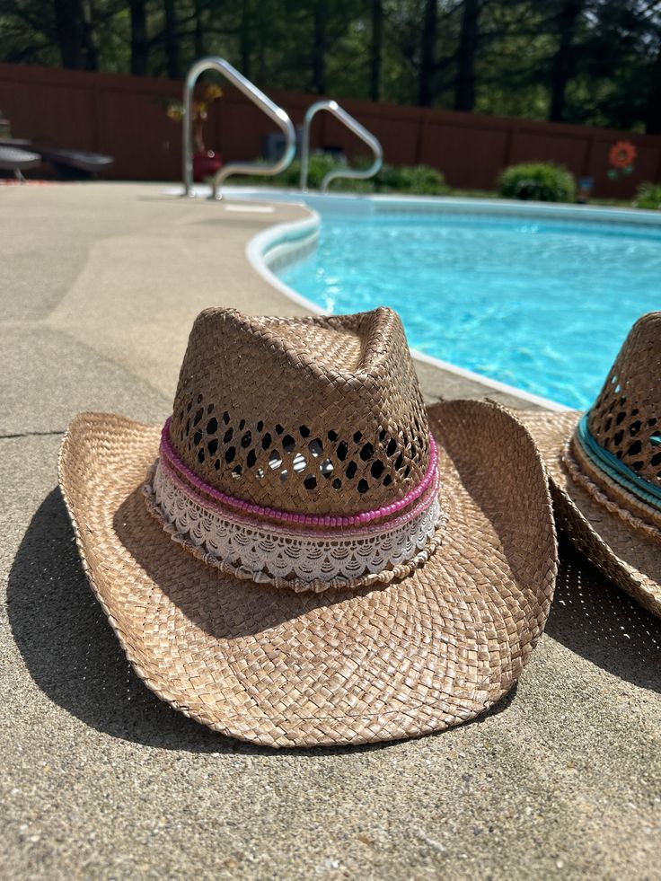 Saddle up in style with our Coastal Cowgirl Straw Beaded Charm Hat! This stunning hat features: - A natural straw material with a wide brim and high crown- Colorful beaded charm accents adding a bohemian touch- Perfect for beachy vibes or country VIBES Add a touch of coastal charm to your outfit with this unique hat. Ideal for: - Beach days and poolside lounging- Music festivals and outdoor events- Everyday wear for a stylish, laid-back look Ride off into the sunset with our Coastal Cowgirl Stra Adjustable Sun Hat For Spring Music Festival, Braided Natural Straw Hat For Festival, Natural Braided Straw Hat For Festivals, Bohemian Braided Brimmed Hat, Spring Straw Sun Hat For Western-themed Events, Summer Woven Hat Bands For Festivals, Bohemian Woven Sun Hat For Beach Season, Adjustable Wide Brim Sun Hat For Music Festivals, Festival Braided Straw Hats