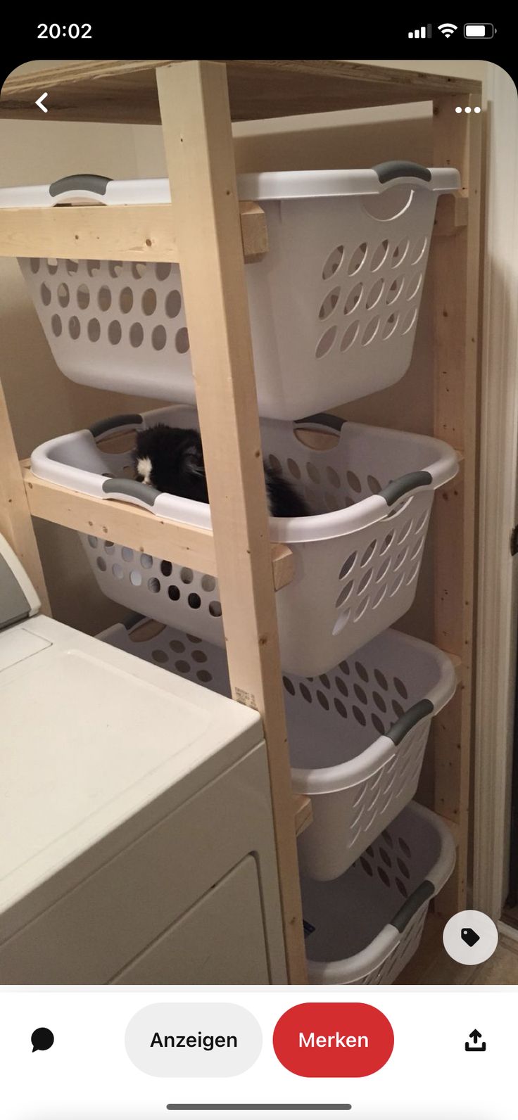 a laundry room with several baskets on the shelves