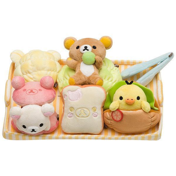 there are stuffed animals and toys on the tray