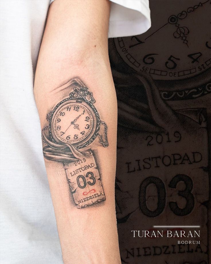 a person with a clock tattoo on their arm