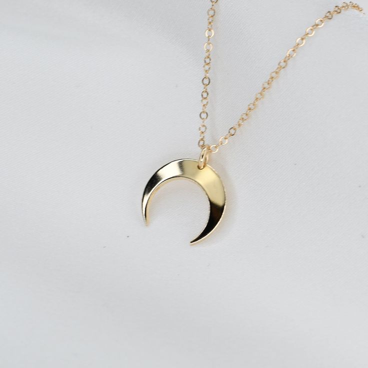 "14K Solid Gold Tiny Crescent Moon Necklace. 14K Gold Crescent Moon Necklace. Dainty Necklace This necklace is 14k solid yellow gold. The necklace will be shipped in a beautiful gift box. 14k gold tiny crescent moon charm is 1/2\", 22 gauge. 14K gold necklace is 1.2mm flat cable chain 14k gold components Please read our policies before you place your order. https://www.etsy.com/shop/SashJewelry/policy?ref=shopinfo_policies_leftnav To see other Mother daughter necklace set click here: https://www Dainty Crescent Gold Plated Necklace, Crescent Moon Charm Necklace In 14k Gold, 14k Gold Filled Crescent Moon Necklace, Gold Crescent Moon Charm Necklaces, Rose Gold Crescent Moon Charm Necklace, Gold Crescent Moon Necklace, Mother Daughter Necklaces Set, Crescent Moon Necklace Gold, Other Mother