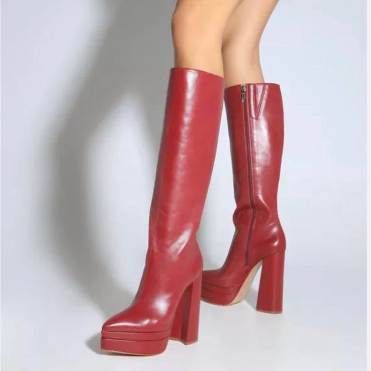 This Lovely Boot Would Be A Great Addition To Your Closet. The Color, Style And Heel Are Fun And Versatile. Red High Heel Platform Boots For Fall, Bold Leather Platform Boots For Fall, Chic Red Platform Boots For Fall, Fall Red Platform Boots With Reinforced Heel, Red Platform Heeled Boots For Party, Red Party Platform Boots, Red Platform Boots With Red Sole For Party, Bold Leather Platform Boots With Round Toe, Bold Leather Boots With Round Toe