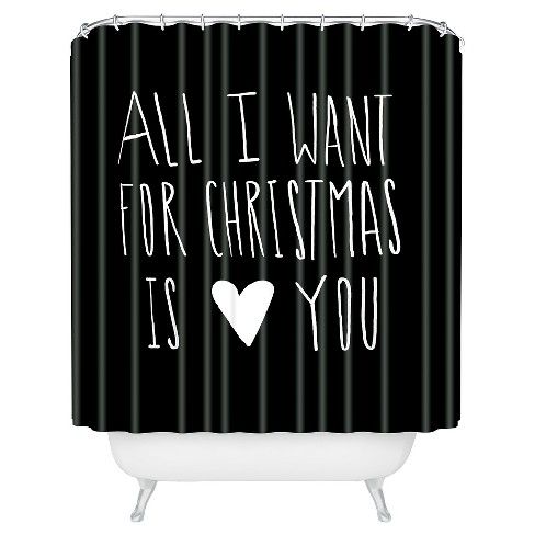 a black and white shower curtain with the words all i want for christmas is you