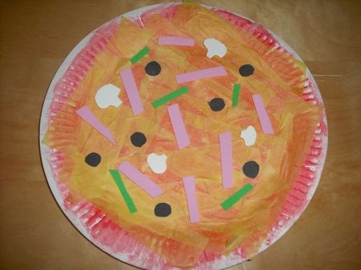 a paper plate with doughnuts and sprinkles on it