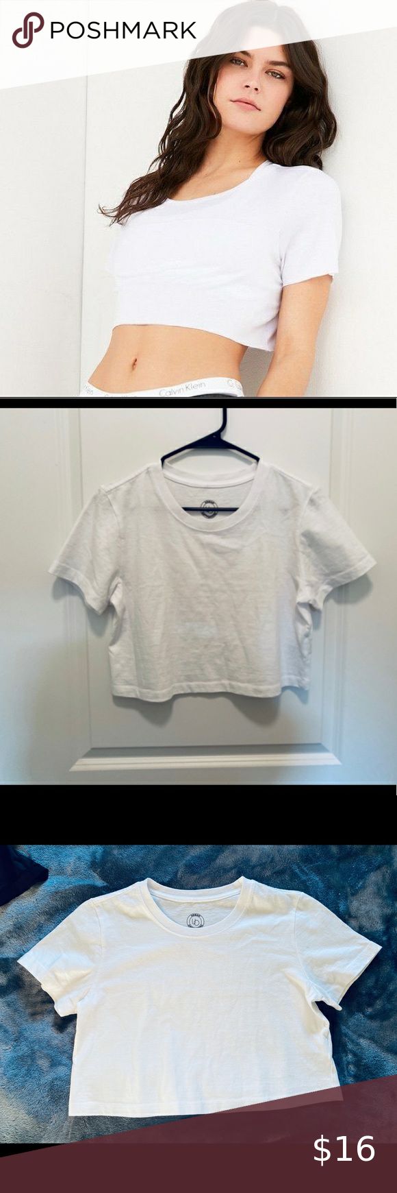 NWOT!! Urban Outfitters White Crop Tee NWOT!!! One stain on left side of neckline One stain on right shoulder area Please see pictures, barely noticeable!! Make an offer! Urban Outfitters Tops Crop Tops Urban Outfitters White Crop Top For Day Out, Urban Outfitters White Relaxed Fit Top, Casual White Urban Outfitters Crop Top, Urban Outfitters White Short Sleeve Crop Top, Urban Outfitters Fitted Crew Neck Crop Top, White Crop Tee, Cropped White Tee, Urban Outfitters Tops, White Crop