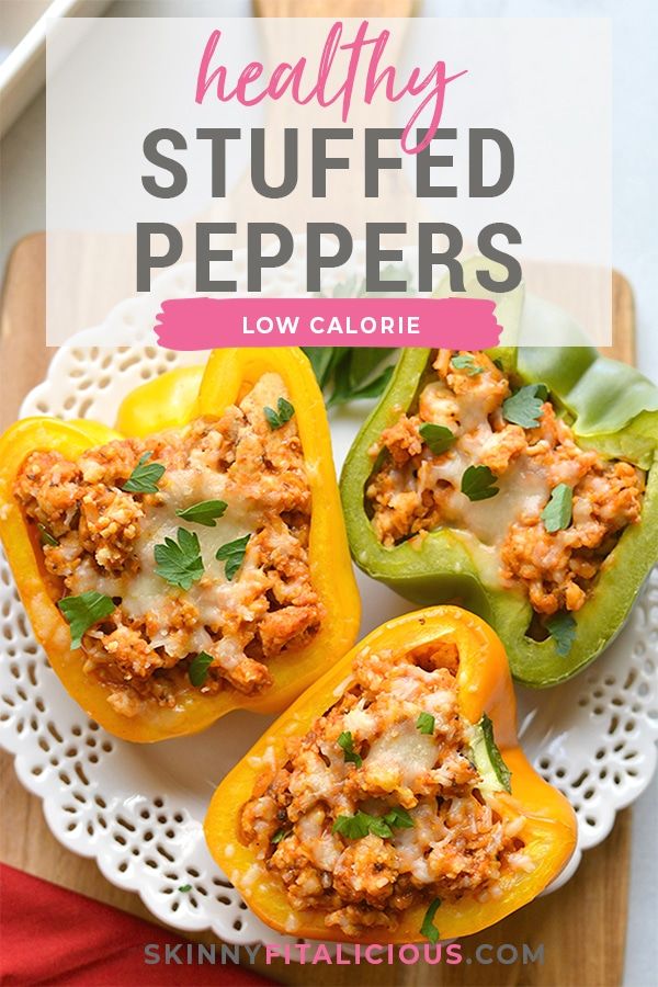 three stuffed peppers on a white plate with text overlay that reads healthy stuffed peppers low calorie