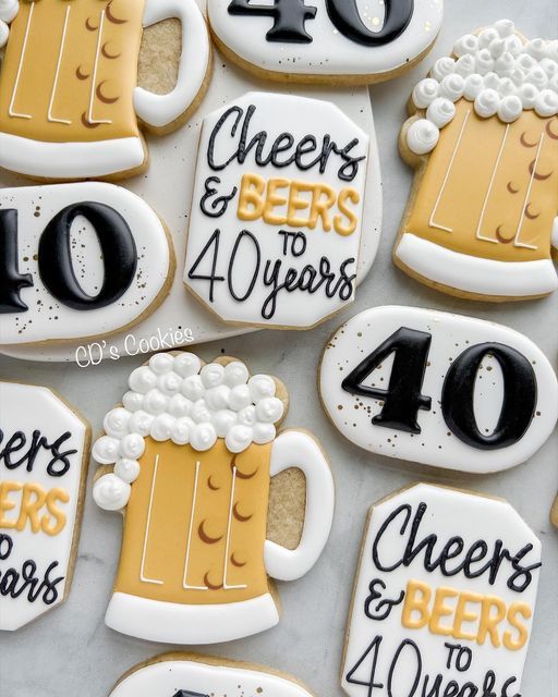 decorated cookies with beer and cheers written on them