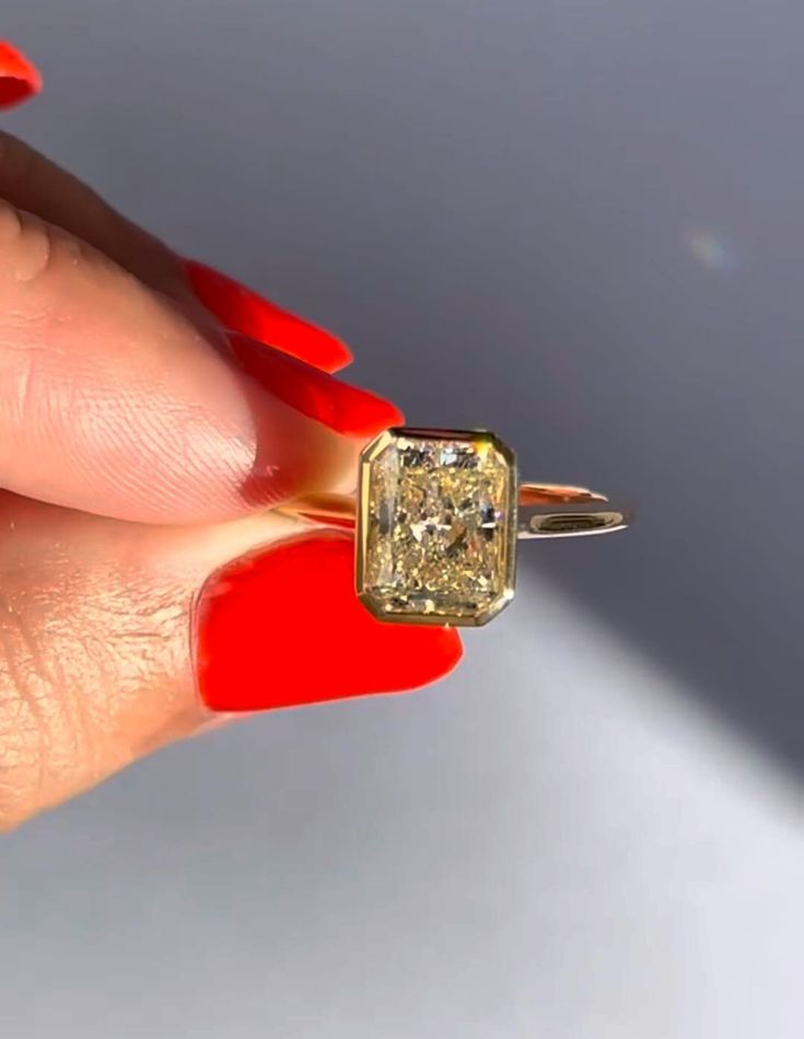 Ice Crushed 3 CT Yellow Radiant Cut Moissanite Bezel Setting Diamond Engagement Ring 10K 14K 18K Solid Yellow Gold Wedding Ring Gift For Her R I N G M E T A L ✥ Metal : 10K 14K 18K Solid Yellow Rose and White Gold, 925 Sterling Silver ✥ Metal Clarity : 100% Pure ✥ Stamp/Hallmark : Yes. Will be Indicated Inside The Ring M A I N S T O N E S & S I D E S T O N E ✥ Type : Moissanite Diamond ✥ Diamond Shape : Radiant Cut Diamonds ✥ Diamond Weight : 3 Carat   ✥ Diamond Color :  Yellow ✥ Clarity : VVS1 ✥ Certificate : (No Extra Charges For Certificate) ✥ Diamond Cut : Excellence, Brilliant  R I N G S I Z E S ✥ All Ring Size are Available ✥ Free Sizing ✥ If You Have any Questions With Regards to Sizing Please Contact as ✥ Please Send me a Message If You Need a Size not Listed S H I P P I N G ✥ Free Gold Solitaire Jewelry With Lab Grown Diamond, Gold Gia Certified Baguette Cut Ring, Gia Certified Gold Baguette-cut Ring, Anniversary Jewelry With Bezel Setting And Radiant Cut, Gold Emerald-cut Lab Grown Diamond Wedding Sets, Gia Certified Yellow Gold Jewelry For Proposal, Anniversary Jewelry With Radiant Cut In Bezel Setting, Moissanite Baguette Cut Jewelry With Bezel Setting, Radiant Cut Bezel Setting Promise Ring