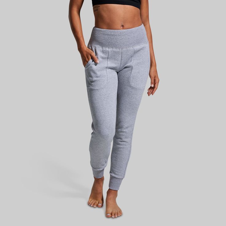 You put in the work on training day, now it’s time to recover with our women's light grey joggers. Made from a stretchy and ultra-soft textured material, slide on our Cloud Joggers for every hard-earned rest day and relax in cloud-like comfort. And don’t worry, if active rest days are more your style, these grey sweats with pockets are the perfect option for light jogs or mobility days. Gray Activewear For Gym, Gray Activewear With Ribbed Waistband For Gym, Gray Activewear With Ribbed Waistband For Workout, Gray Gym Activewear With Elastic Waistband, Comfortable Gray Activewear For Sports, Gray Athleisure Activewear With Elastic Waistband, Athleisure Sweatpants With Comfort Waistband For Yoga, Athleisure Joggers With Elastic Waistband For Yoga, Athleisure Joggers For Yoga With Elastic Waistband