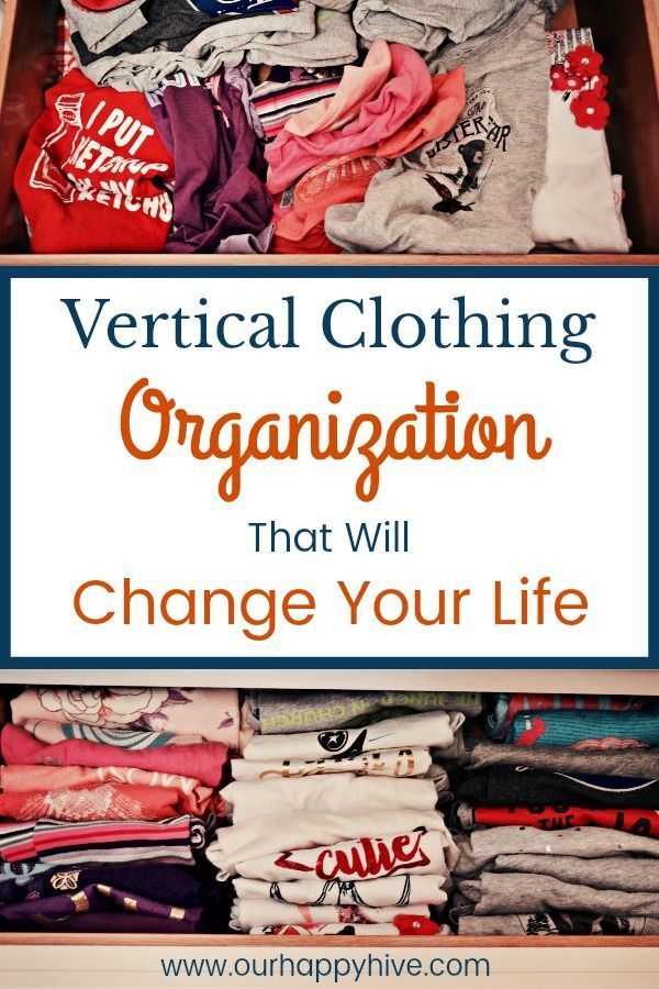 an open drawer filled with clothes and the words vertical clothing organization that will change your life