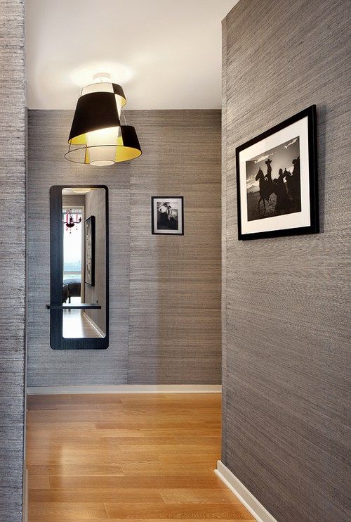 12 Chic Ways to Use Textured Wallpaper in Your Home Wallpaper Bedroom Feature Wall, Accent Wall Entryway, Contemporary Hallway, Feature Wall Bedroom, Stairway Lighting, Silver Wallpaper, Hal Decor, Wallpaper Accent Wall, Wallpaper Accent