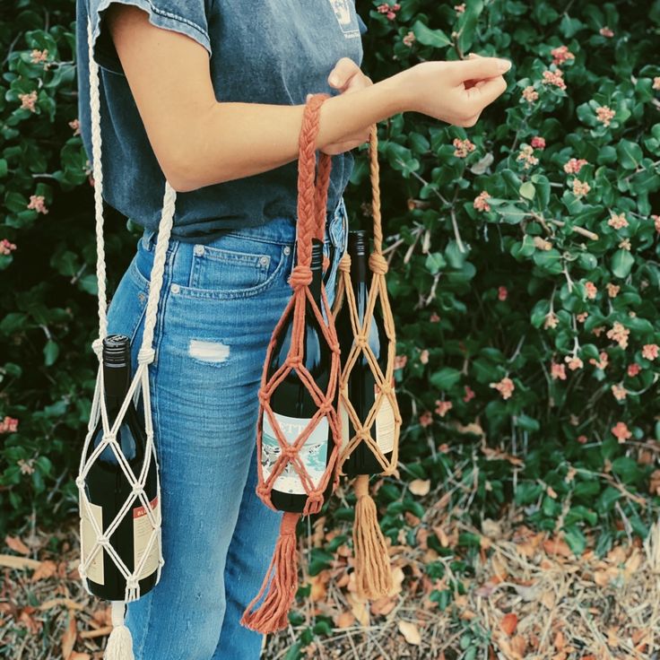 a woman is standing outside with her handbag