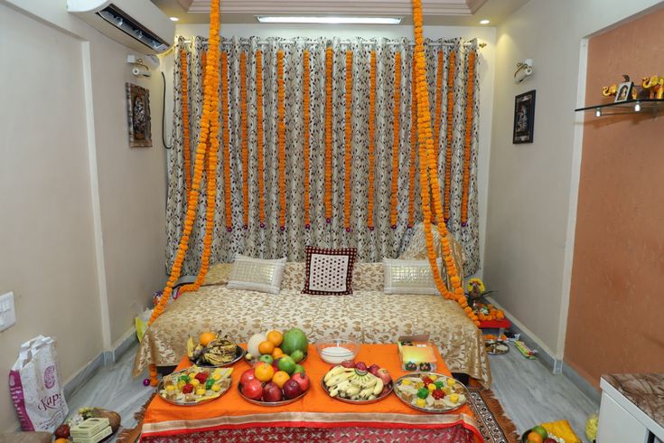 a bed room with a neatly made bed covered in fruit