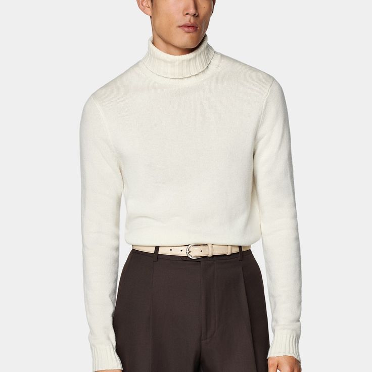 A classic style in a luxurious cashmere blend, this off-white turtleneck sweater is a richly structured and elegantly simple addition to your winter wardrobe whether it's on its own or under a tailored jacket. Elegant Business Sweater For Winter, Elegant Winter Business Sweater, Elegant Business Winter Sweater, Elegant Formal Winter Sweater, Classic Solid Sweater For Formal Occasions, Classic Beige Turtleneck For Fall, Classic Solid Color Formal Sweater, Classic Formal Winter Sweater, Elegant Wool Sweater For Formal Occasions