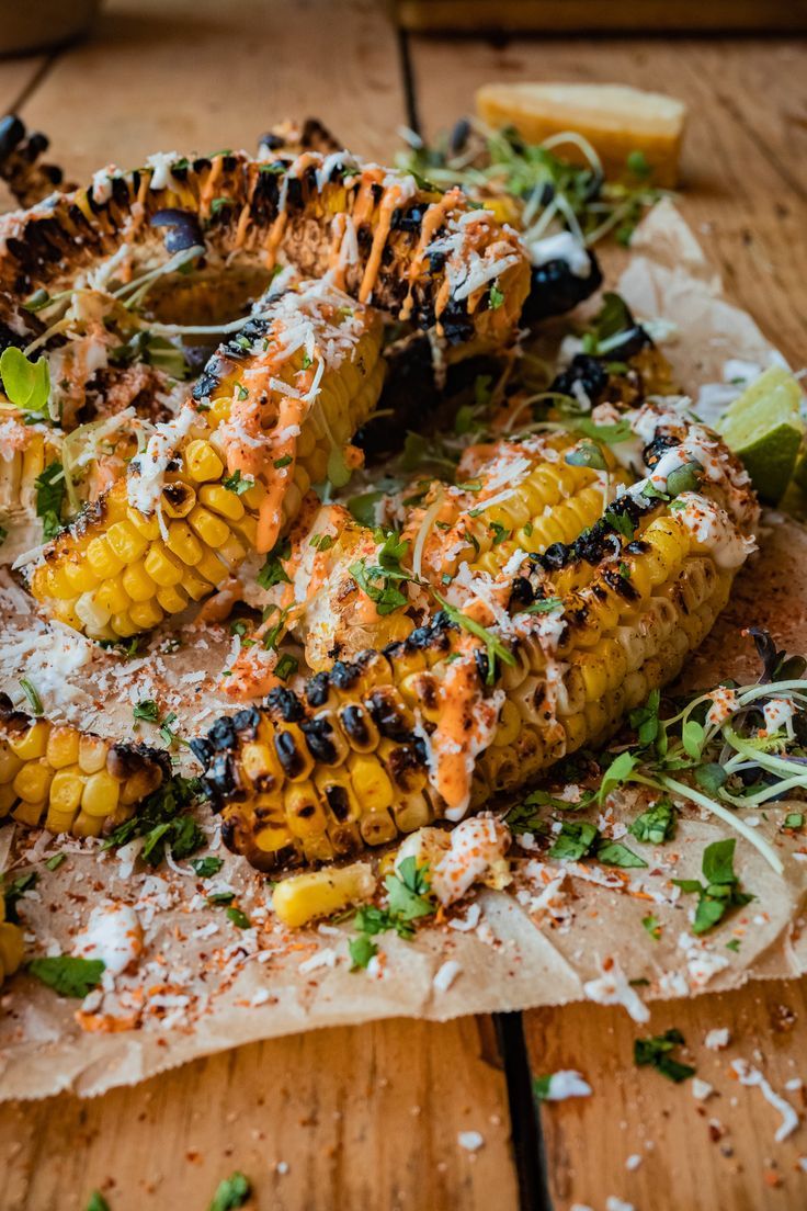 Elote style grilled corn ribs served with Mexican crema, spicy aioli, chopped cilantro, tajin and parmesan cheese. Elote Corn Ribs, Mexican Corn Ribs, Corn Ribs Recipe, Bbq Spread, Mexican Style Corn, Corn Ribs, Grilled Kabob Recipes, Vegetarian Ideas, Spicy Aioli