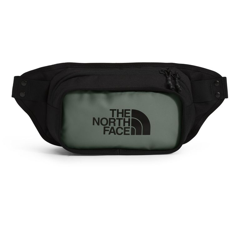 evo.com | The North Face Fanny Packs > Explore the urban playground in style with The North Face Explore Hip Pack. One zippered compartment keeps organization simple with a sleeve for a phone and your essentials. Key-fob Loop 6.5 x 2.75 x 15" (16.5 x 7 x 38.1cm) 100% Nylon One Zippered Compartment with Phone and Coin Sleeves Adjustable Webbing Strap Allows You to Carry the Pack as a Lumbar or Cross-Body | The North Face Explore Hip Pack 2021 in Green | Nylon Modern Bags With Zipper Closure For Outdoor Activities, The North Face Practical Bags For Everyday Use, Practical Black The North Face Bag, Practical The North Face Bags For Everyday Use, Black Sporty Travel Accessories For Outdoor, Black Sporty Outdoor Travel Accessories, Functional The North Face Bags For Everyday Use, Functional Nylon Bag By The North Face, Functional Nylon Bags By The North Face