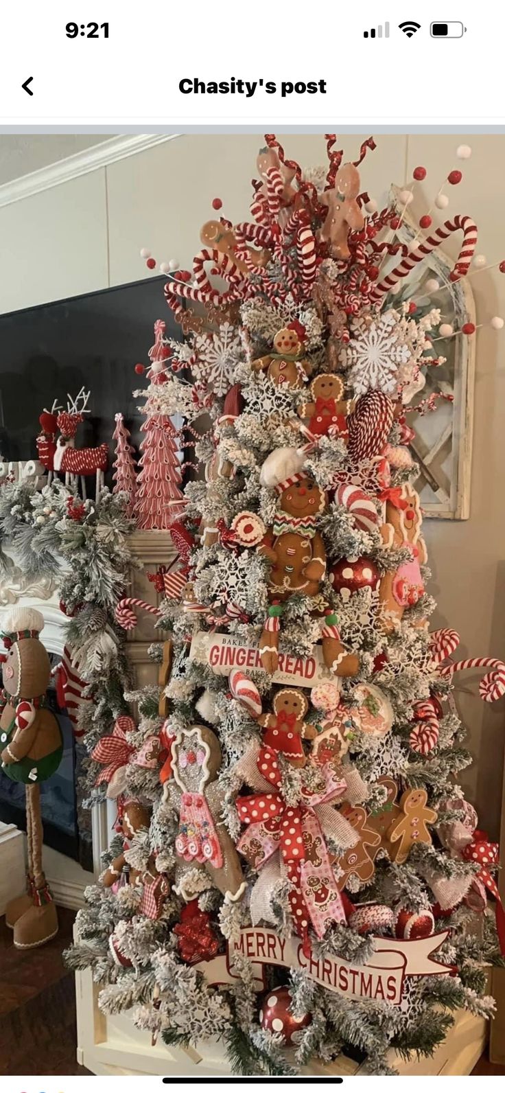 a christmas tree decorated with red and white ornaments