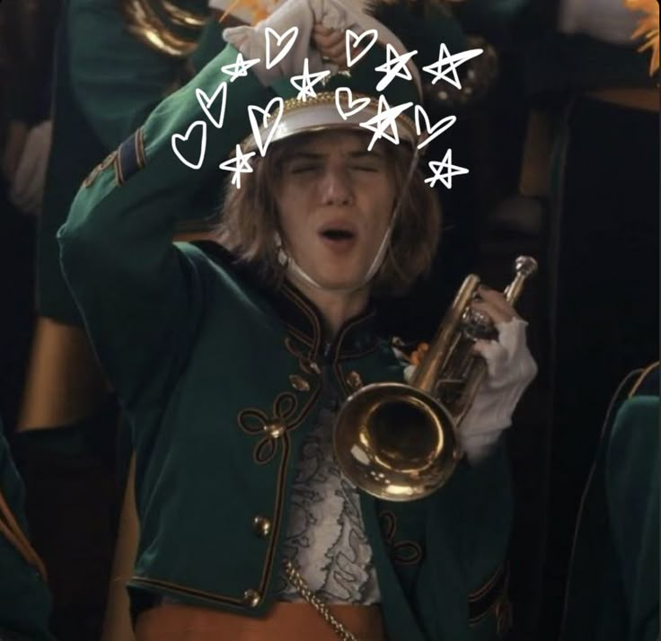 a woman in green uniform holding a trumpet and wearing a white hat with stars on it