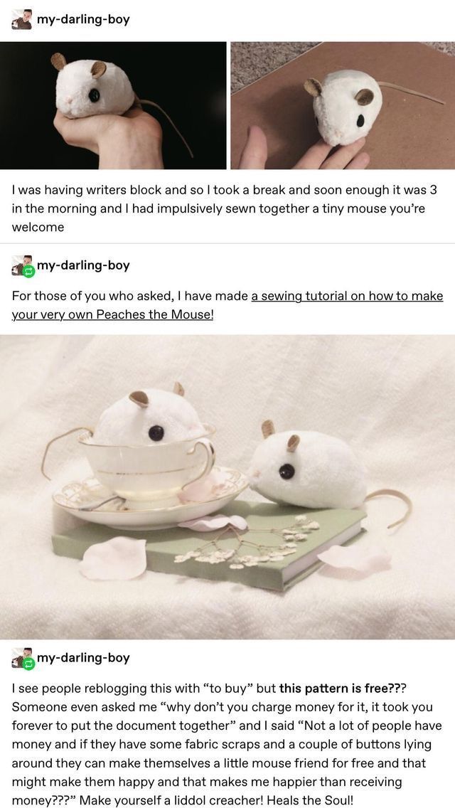 the mouse is sitting on top of a book and it looks like he's trying to