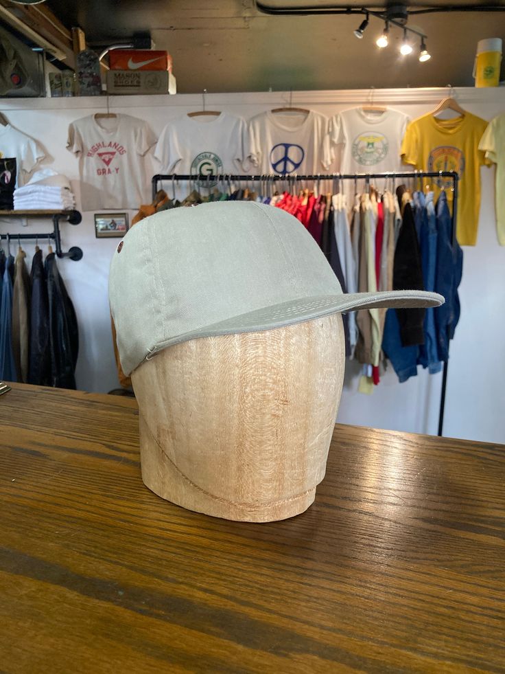 "Deadstock vintage 1960s twill khaki fitted baseball cap. Cotton. multiple sizes available, please specify size at checkout. - - - - - - - - - - - - - - - - - - - - - - - - - - - - - - - - - - - - - - - -  INTERNATIONAL SHIPPING AVAILABLE UPON REQUEST Craft Union does NOT accept returns or exchanges, all items are FINAL SALE Please consider the following prior to placing an order : Because measurements are provided, Craft Union does NOT grant refund/exchange requests if an item does not fit. We are always happy to assist interest buyers with any size/fit concerns using the \"ask a question/message\" feature! Most vintage & antique items are rarely found in new/unused condition, visible age and wear often adds to their value and desirability so imperfections of all kinds are to be expected. Vintage Fitted Hats For Outdoor, Khaki Flat Bill Hat, One Size Fits Most, Vintage Fitted Outdoor Hat, Khaki Flat Bill Hat One Size, Khaki Flat Bill Hat One Size Fits Most, Classic Everyday Flat Cap Baseball Cap, Khaki Cotton Snapback Hat With Curved Brim, Classic Fitted Baseball Cap With Flat Bill, Khaki Cotton Flat Bill Snapback Hat