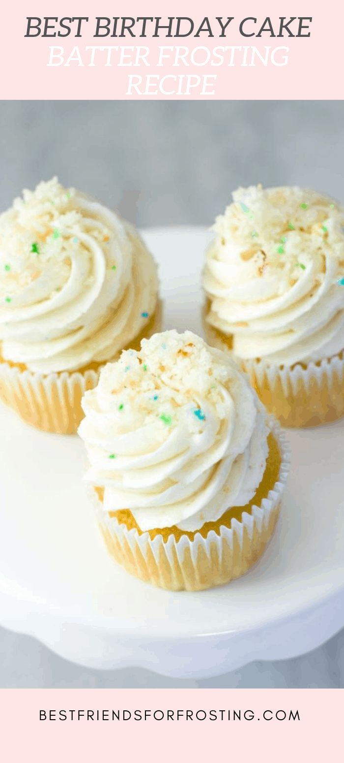 three cupcakes sitting on top of a white plate