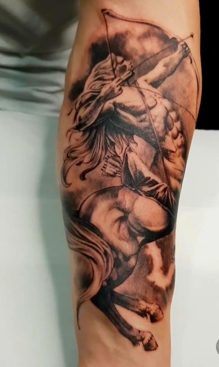 a man with a tattoo on his arm holding onto a horse and an arrow in the other hand