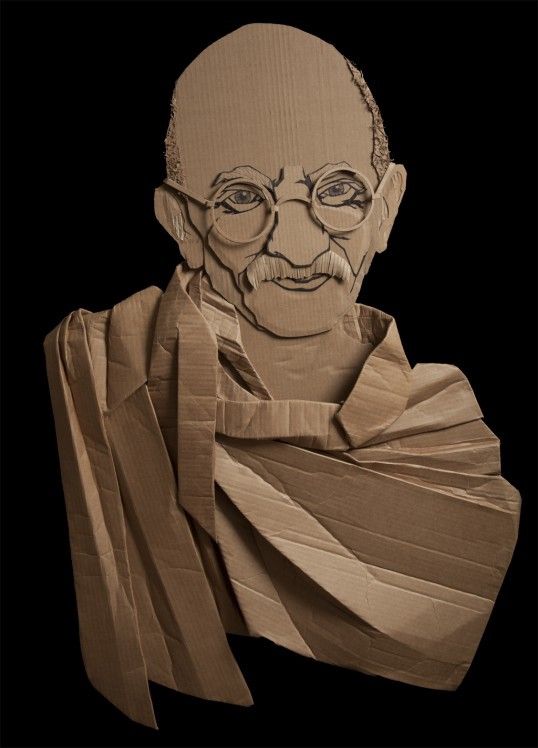 a cardboard cut out of an old man with glasses