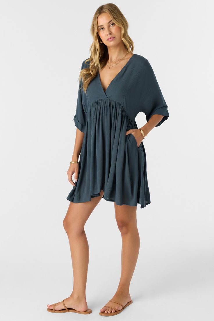 Essential woven mini dress that has a dolman sleeve design, lightweight fabric feel and solid color wash. O'Neill Women's woven mini dress 32.5" In length Dolman sleeve On seam pockets Back neck tie Solid color wash 100% Viscose Crinkle | O'Neill Women's Rosemary Solid Short Sleeve Dress in Slate, Size XS, Viscose Gauze Dress, Woman Weaving, Dresses Xxl, Junior Outfits, Short Sleeve Dress, Elbow Length Sleeve, Halloween Dress, Mini Dress With Sleeves, Fall Winter Outfits