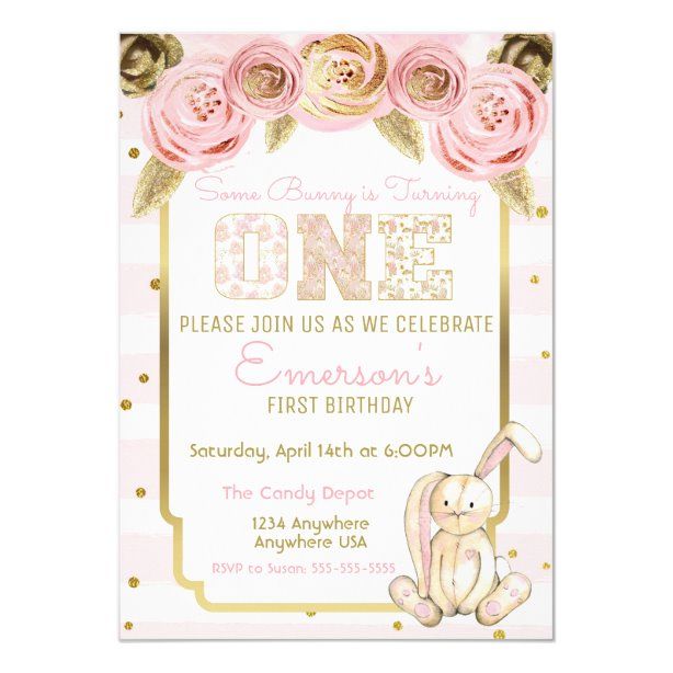 a pink and gold first birthday party with roses on the border, a bunny sitting in front of it