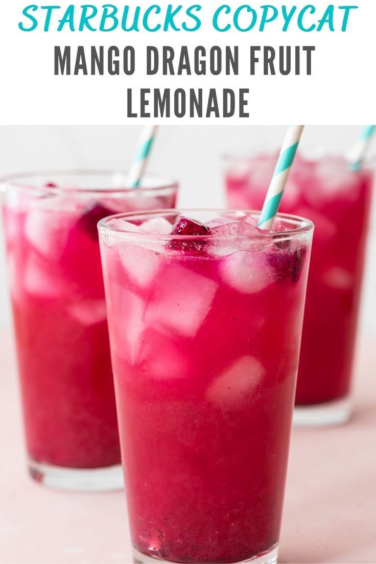 two glasses filled with fruit lemonade on top of a pink tablecloth and text overlay reads mango dragon fruit lemonade