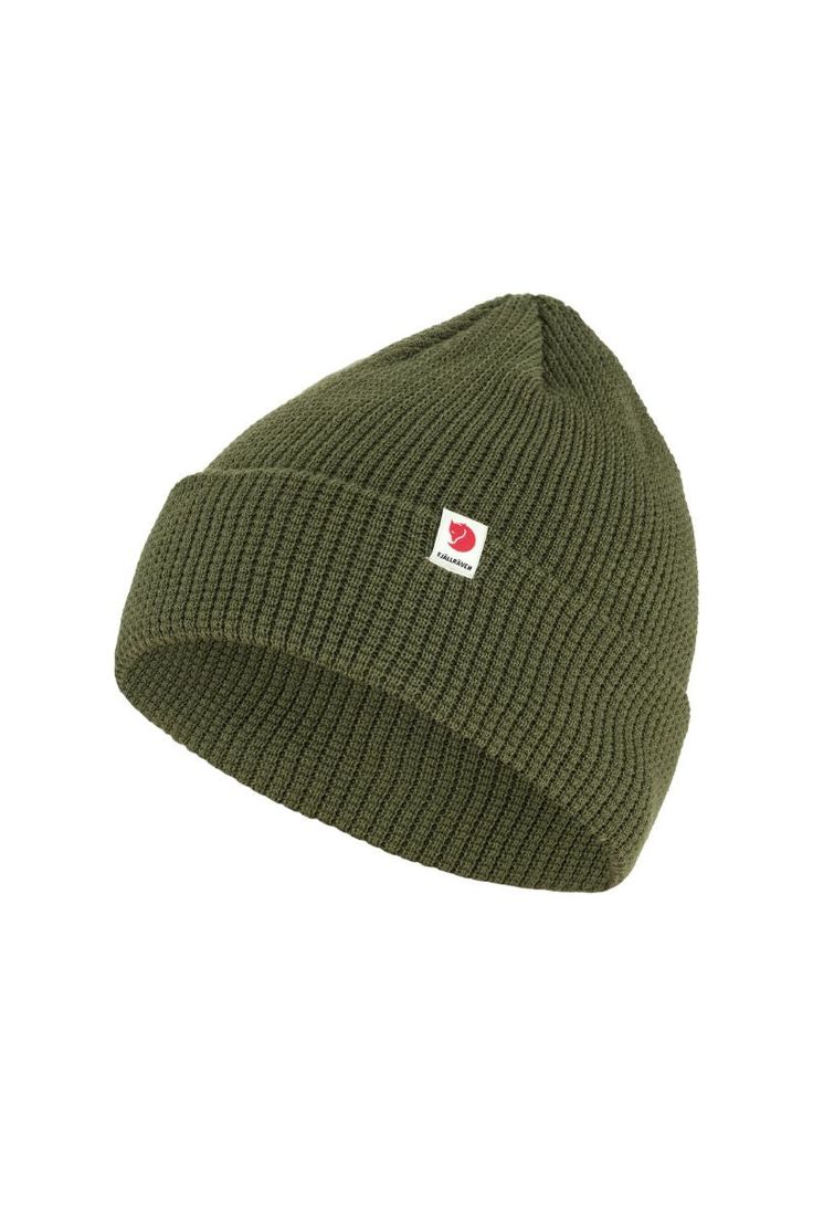 Soft, comfortable knitted hat in recycled polyester. Decorative waffle-knit with wide fold-up edge and little textile logo tab. The material wicks away moisture and dries fast, so it works well for both everyday life and when out in the mountains. Material: 100% polyester (recycled) Embossed Fabric, Textile Logo, Knitted Hat, Brand Tags, Folded Up, Fjallraven Kanken, In The Mountains, Free Birthday Stuff, Padded Jacket