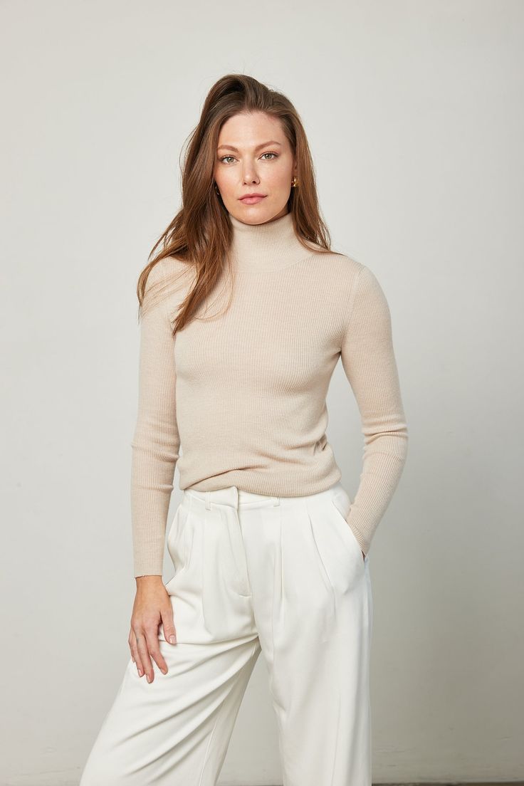 Your wardrobe staple is the Nicole Cashmere Turtleneck in Oyster. Lightweight and super soft, this sweater will pair with all of your elevated essentials. Shown here in a size Medium. 100% cashmere Dry Clean Only Fall Cream Cashmere Sweater, Chic Beige Polo Sweater For Winter, Neutral Cashmere Sweater For Fall, Neutral Long Sleeve Cashmere Sweater, Classic Fine Knit Polo Sweater For Spring, Chic Beige Polo Sweater For Work, Classic Cashmere Sweater In Neutral Color, Chic Cashmere Turtleneck Sweater, Cream Fine Knit Cashmere Sweater